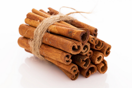 cinnamon against white background