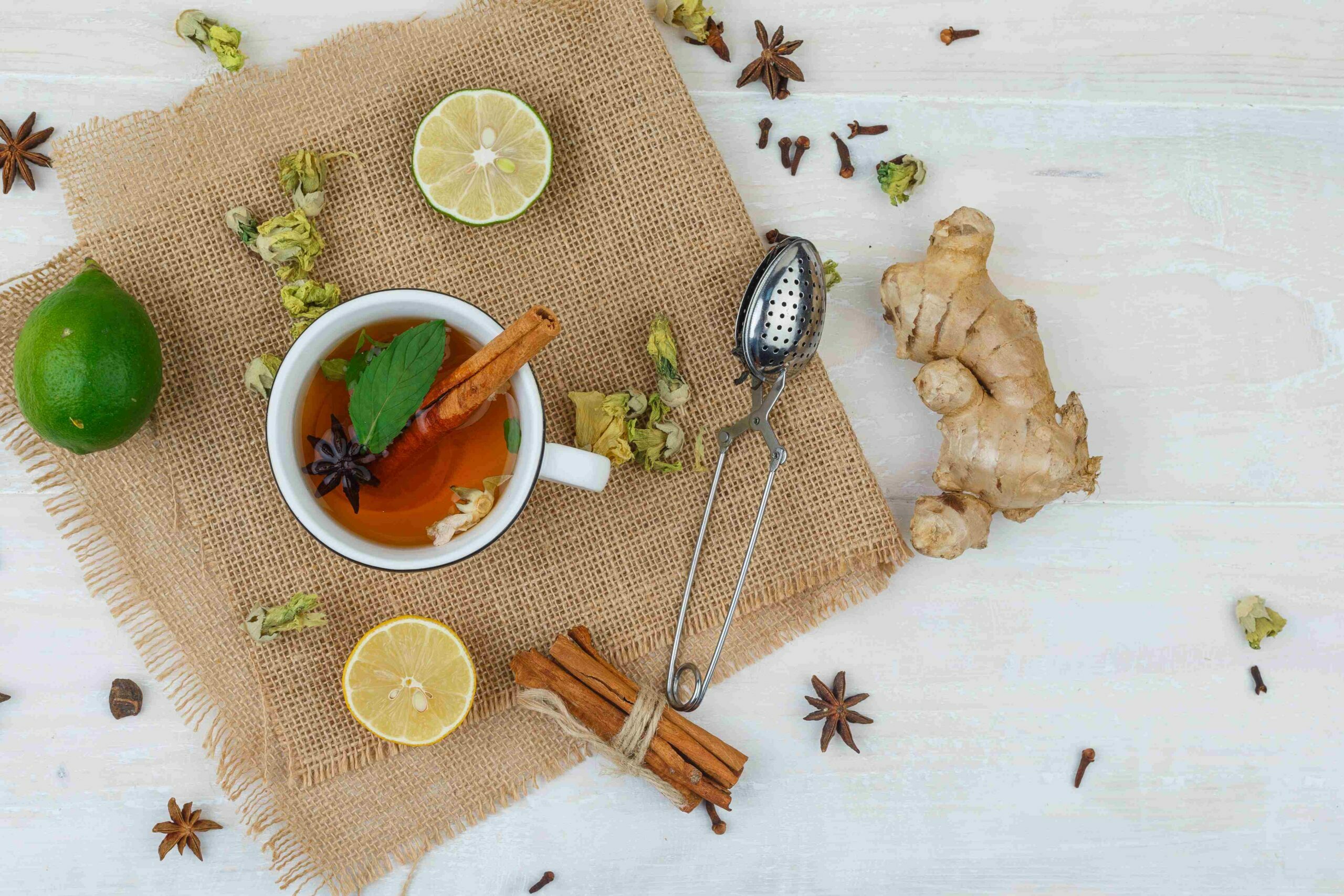 detox kahwa green tea with lime, ginger, clove, cinnamon, and herbs.